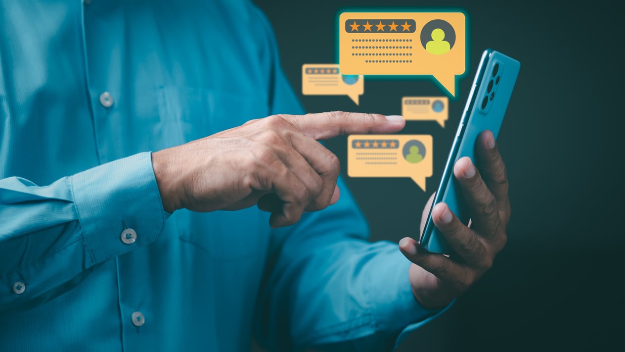 Person Checking Online Reviews on Smartphone