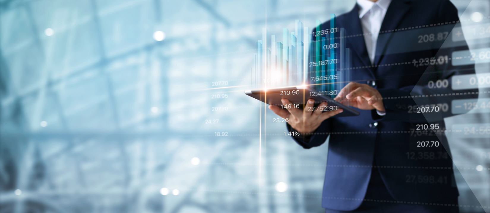 Businessman using tablet analyzing sales data and economic growth graph chart.  Business strategy.  Digital marketing.