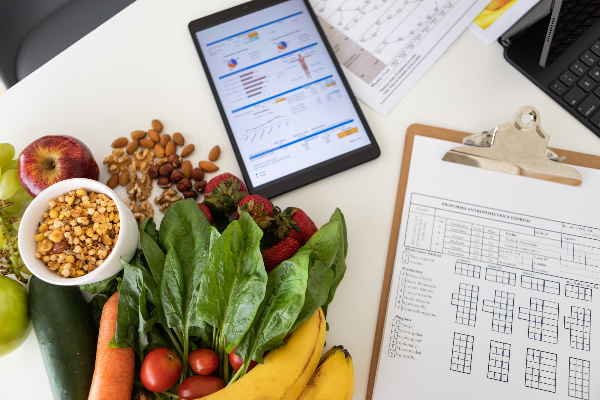Digital nutritional program with heathy food and digital tablet charts