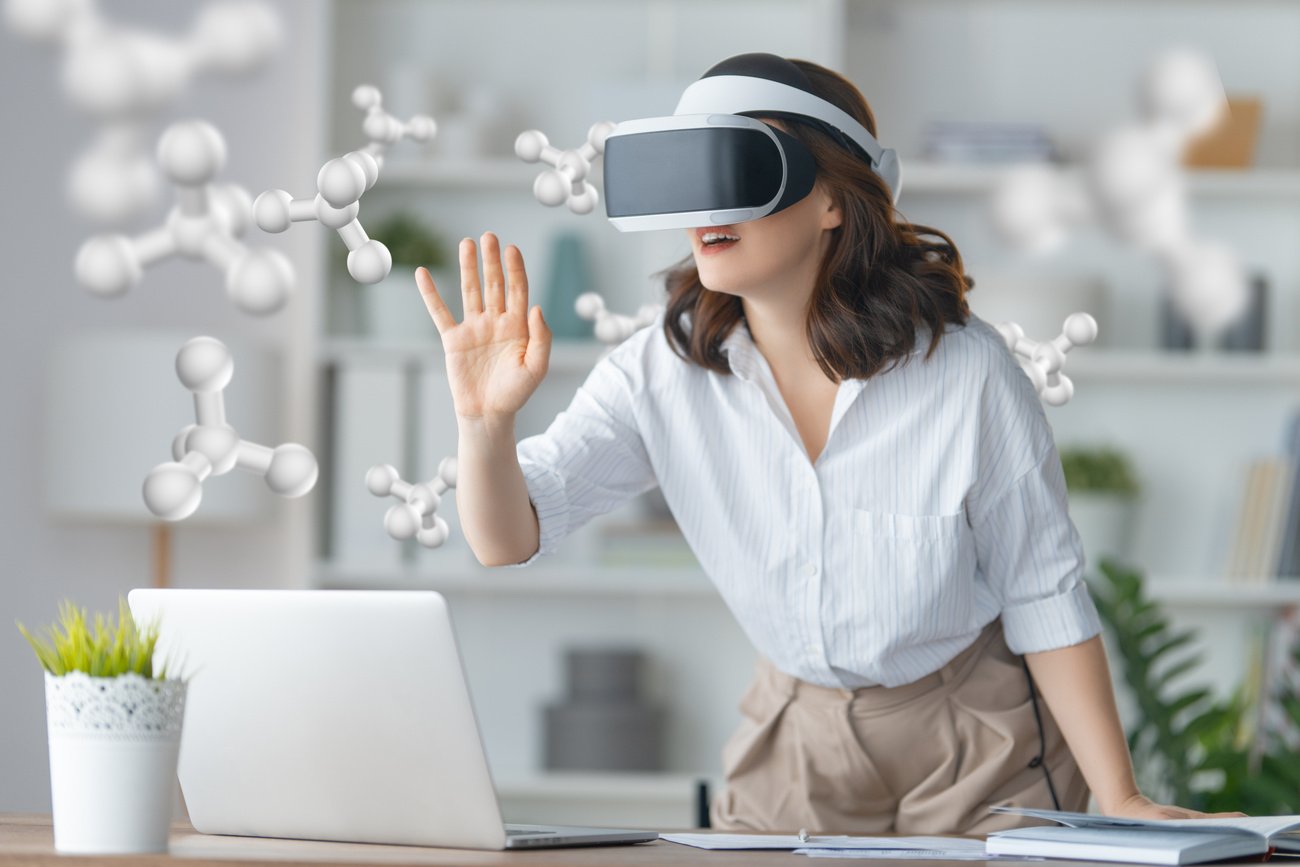 Woman with VR Virtual Reality Goggles
