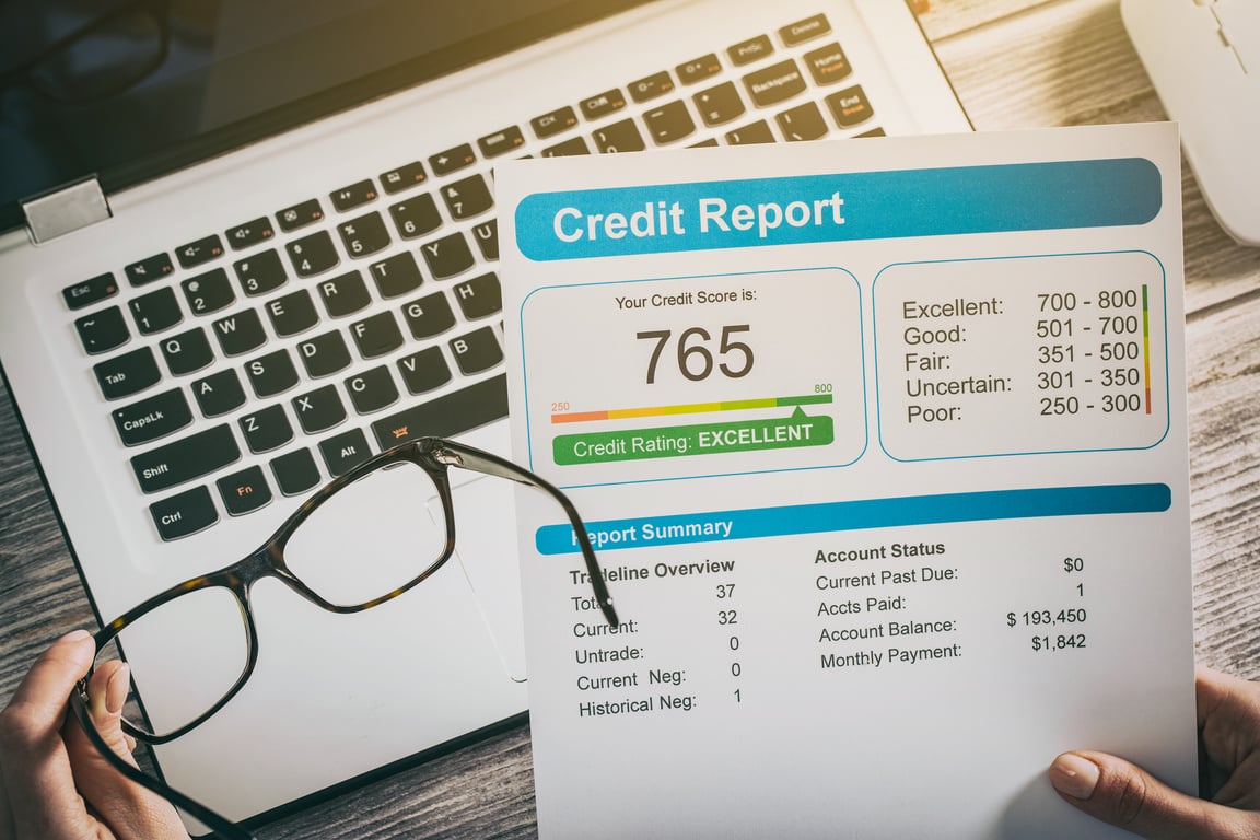 Person Holding a Credit Report