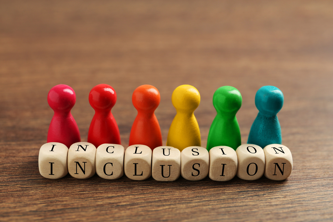 Colorful Pawns and Cubes with Word Inclusion on Wooden Table, Cl