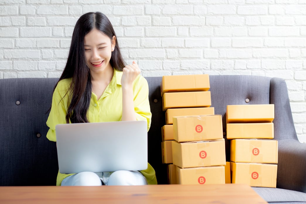 Woman Merchant with Delivery Pacakages 