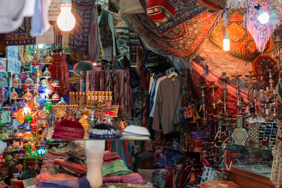 Market or Bazzar in Old City of Jerusalem. Traditional products and souvenirs in antique shop. Israel.