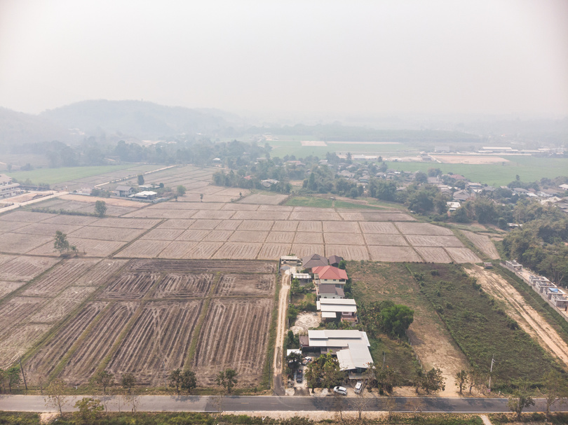 Rural Asian countryside village with smoke pollution problem