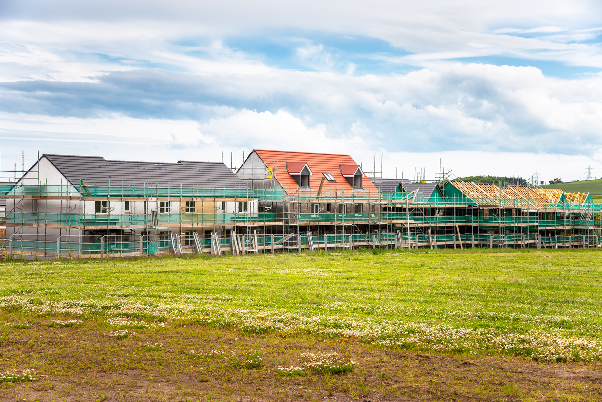 Houses in construction in a housing development in a rural area