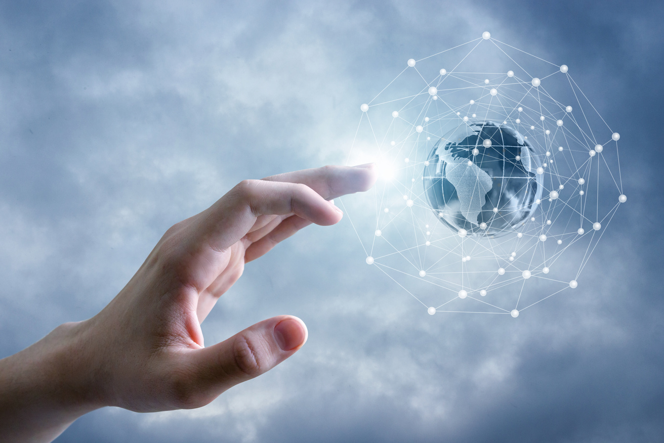 The global network and the hand.