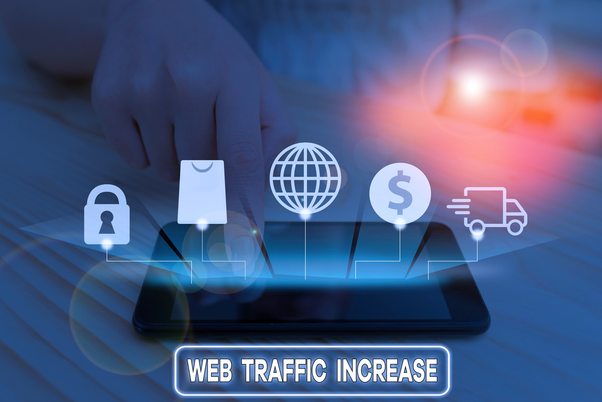 Writing note showing Web Traffic Increase. Business photo showcasing Expand Visitors to a Website a number of Visits.